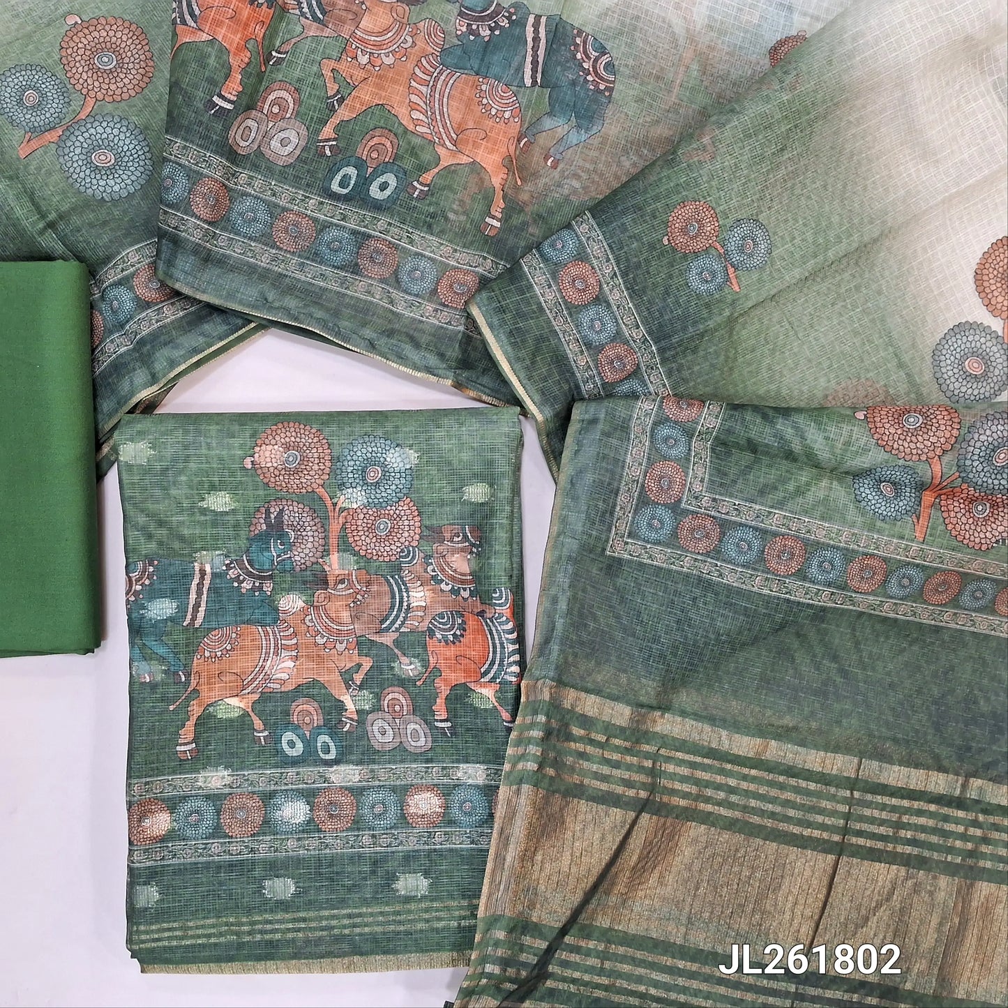 Leafy green benarasi chanderi kota unstitched salwar material,zari buttas all over,digital printed and tissue daman,( lining needed)spun cotton bottom,digital printed dual shaded benarasi chanderi kota dupatta with tissue pallu. JL261802