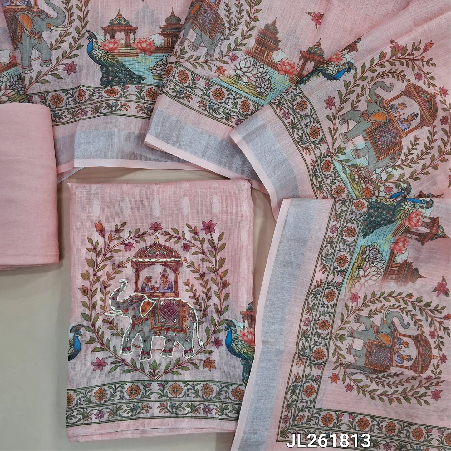 Pastel pink jakard linen unstitched salwar material,floral design on front, digital printed with kantha stitch and french knot work on daman,(lining needed)spun cotton bottom,digital printed semi linen dupatta with silver tissue borders. JL261813