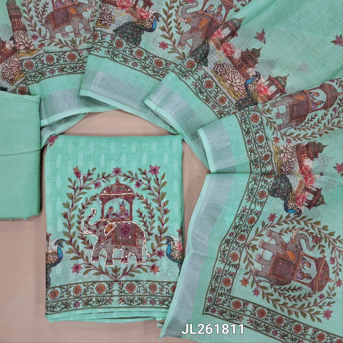 Sea green jakard linen unstitched salwar material,floral design on front, digital printed with kantha stitch and french knot work on daman,(lining needed)spun cotton bottom,digital printed semi linen dupatta with silver tissue borders. JL261811
