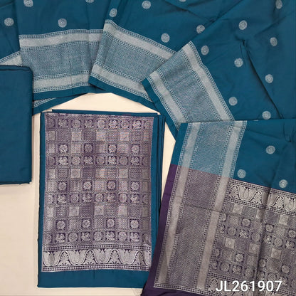 Dark teal blue benarasi silk cotton unstitched salwar material,(PURPLE)brocade weaving yoke patch and daman (lining needed)silk cotton bottom,zari buttas on full length silk cotton dupatta with borders and contrast pallu. JL261907