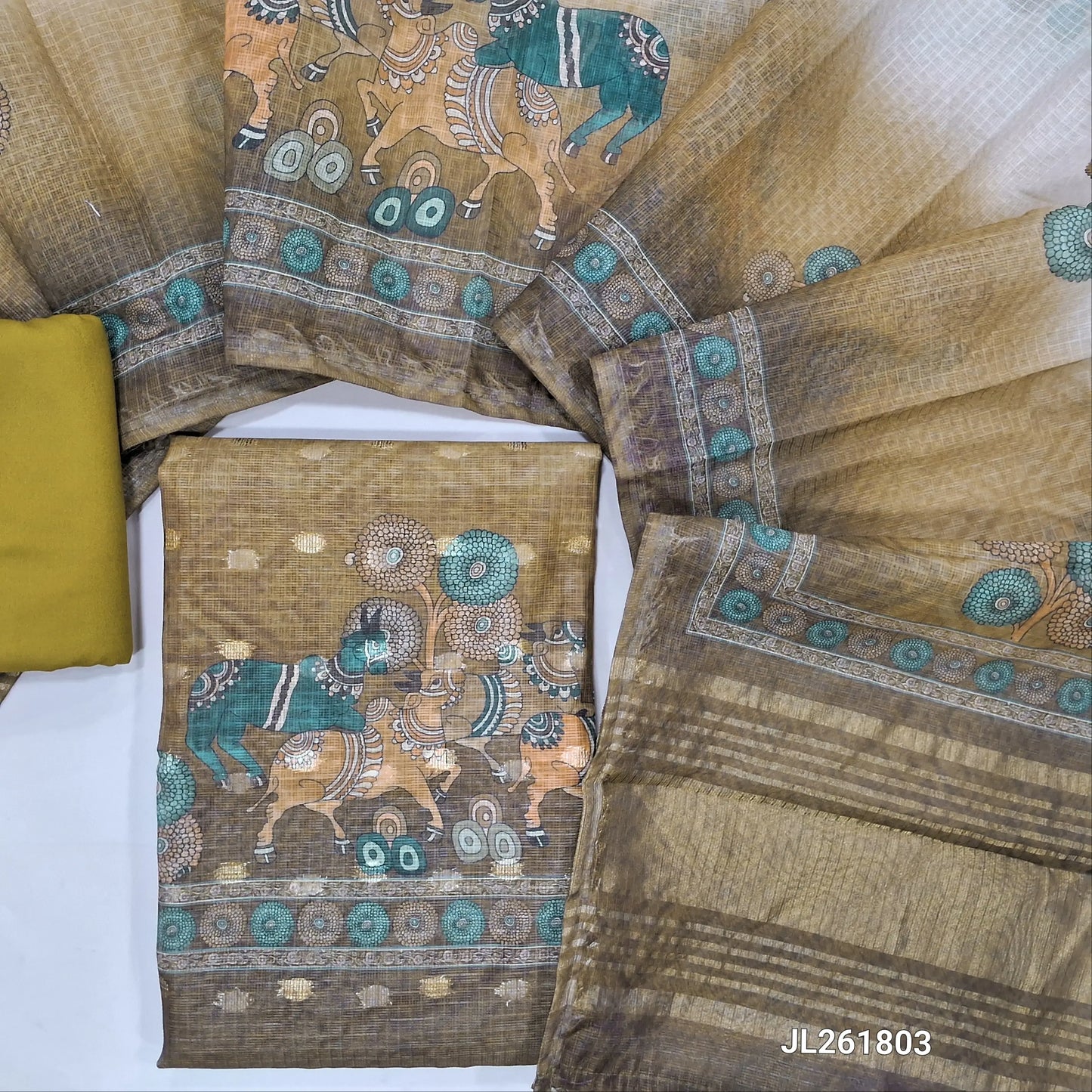Mehandhi yellow & light brown benarasi chanderi kota unstitched salwar material,zari buttas all over,digital printed and tissue daman,( lining needed)spun cotton bottom,digital printed dual shaded benarasi chanderi kota dupatta with tissue pallu. JL261803