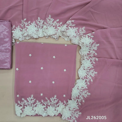 Pastel pink semi georgette unstitched salwar material, floral embroidery on front,embroidery and cut work daman(soft,Lining Needed)matching silky fabric provided for both bottom and lining,semi georgette with embroidery and cut work borders. JL262005