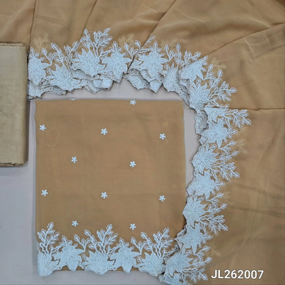 Peachish beige semi georgette unstitched salwar material, floral embroidery on front,embroidery and cut work daman(soft,Lining Needed)matching silky fabric provided for both bottom and lining,semi georgette with embroidery and cut work borders. JL262006