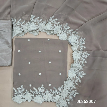 Mauve shade semi georgette unstitched salwar material, floral embroidery on front,embroidery and cut work daman(soft,Lining Needed)matching silky fabric provided for both bottom and lining,semi georgette with embroidery and cut work borders. JL262007