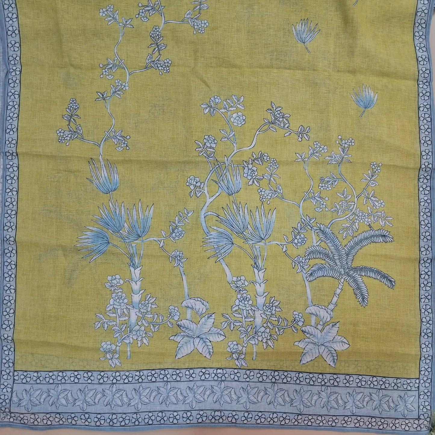 Powder blue premium linen salwar material,V neck printed with bead and sequins work on yoke, rich damna, (textured, lining needed)drum dyed cotton fabric provided for lining, NO BOTTOM,digital printed pure linen with floral printed borders. JL262115