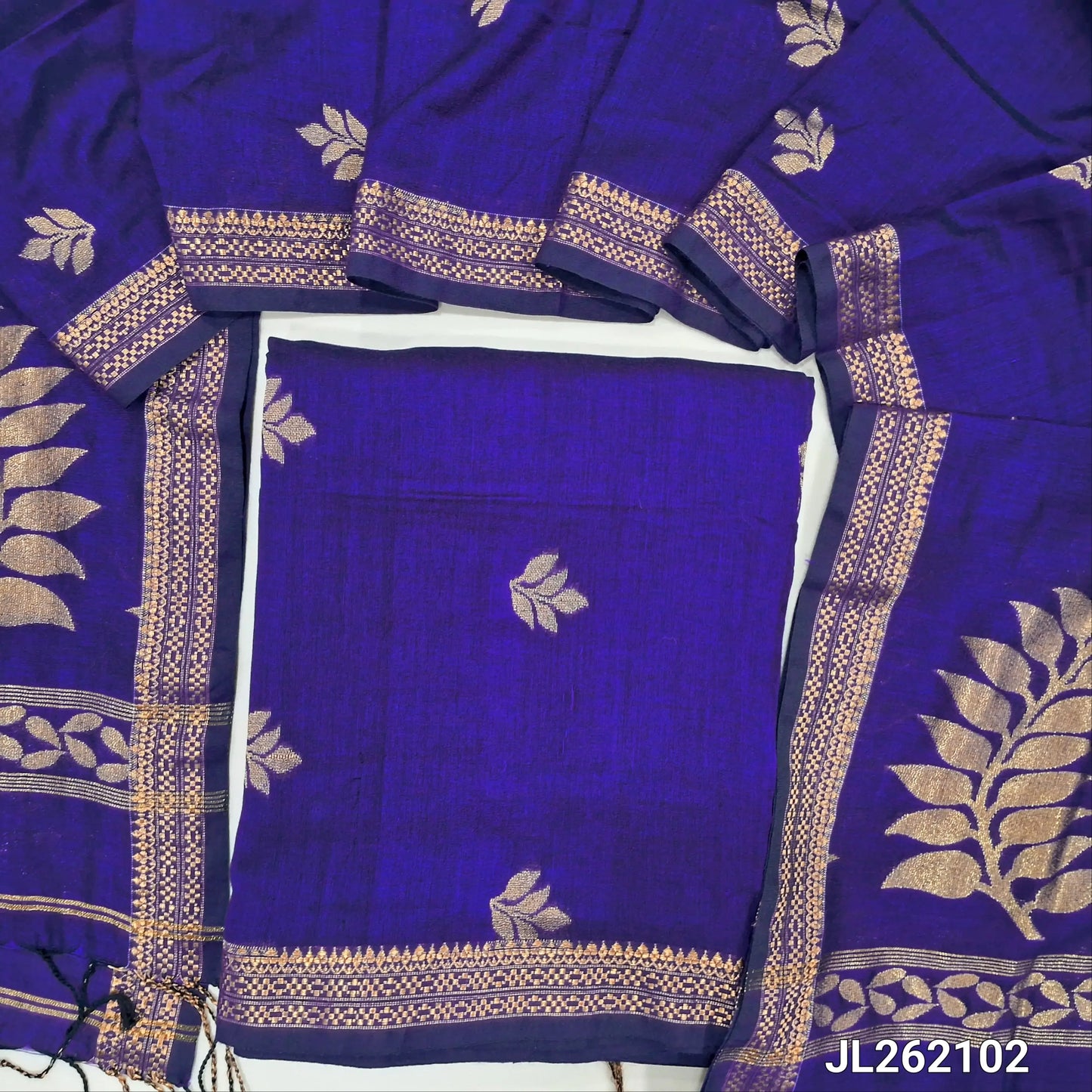 Royal blue premium mulberry silk unstitched salwar material, zari buttas all over,zari woven borders, (lining needed)mulberry silk bottom with zari borders, rich weaving on mulberry silk dupatta with pallu and tassels. JL262102