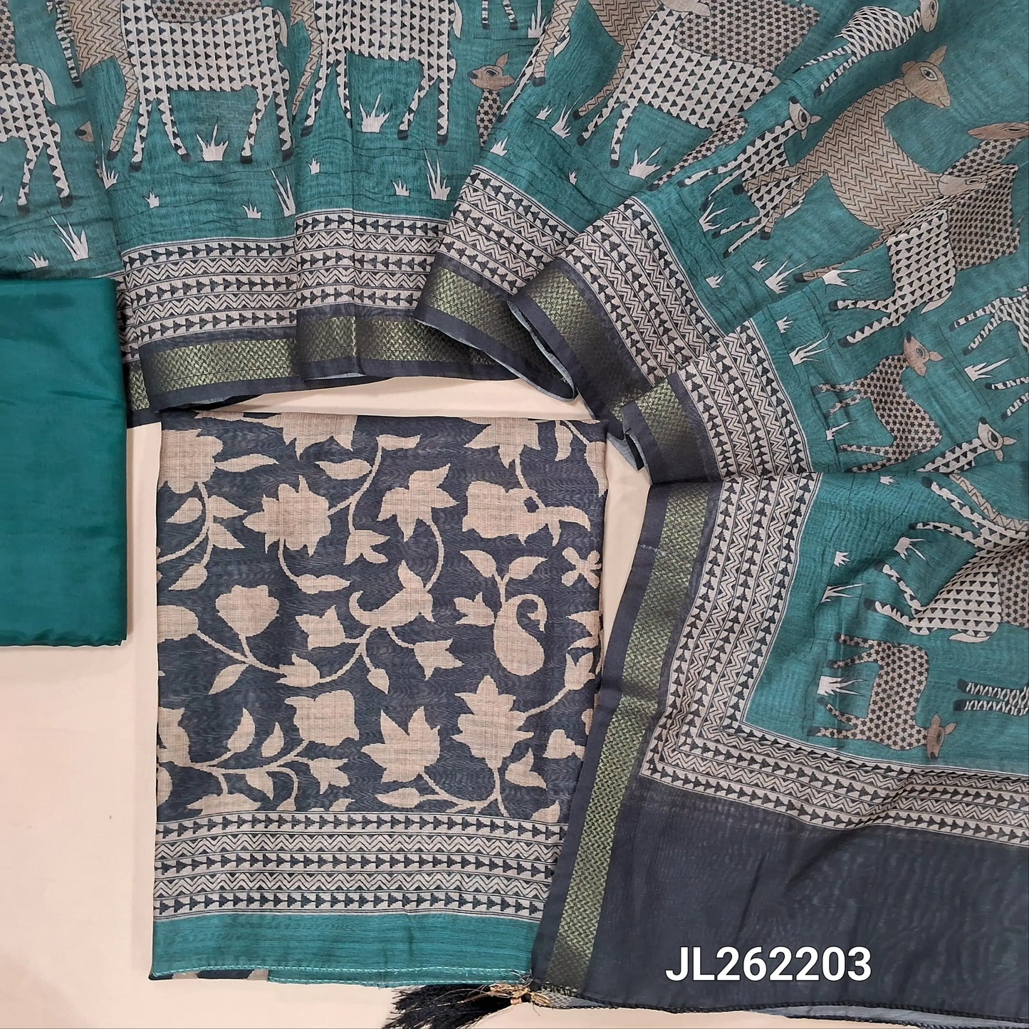 Black base printed moonga slub unstitched salwar material, ( lining needed)teal blue silky bottom,printed moonga slub dupatta with zari borders. JL262203