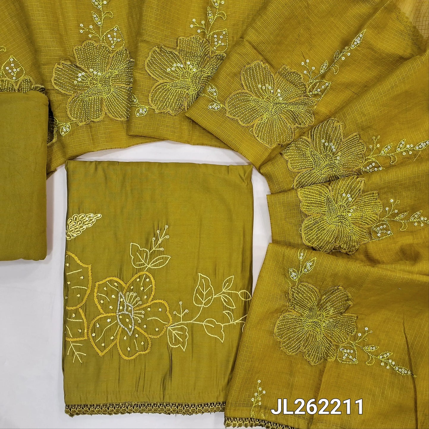 Mehandhi green premium mul chanderi unstitched salwar material,thread embroidery with sugar bead and sequins on daman,( soft,lining needed)spun cotton bottom,embroidery and sequins work on kota dupatta with lace tappings. JL262211