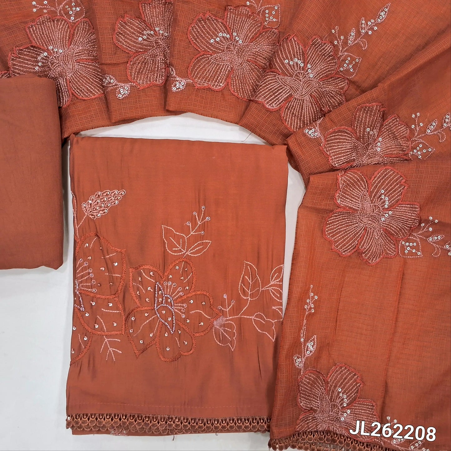Brick red premium mul chanderi unstitched salwar material,thread embroidery with sugar bead and sequins on daman,( soft,lining needed)spun cotton bottom,embroidery and sequins work on kota dupatta with lace tappings. JL262208