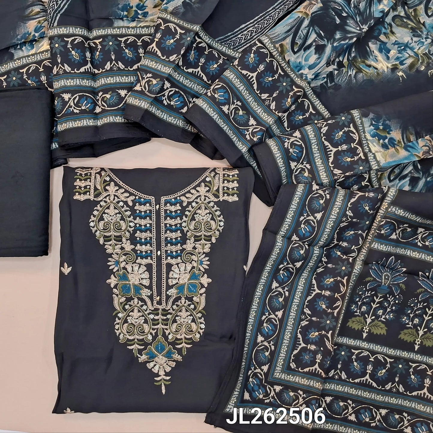Black soft silk cotton unstitched salwar material,thread, sequins and zari work on yoke,(lining needed)santoon bottom,digital printed modal muslin dupatta. JL262506