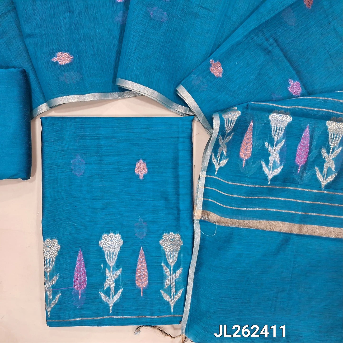 Turquoise blue silk cotton unstitched salwar material,buttas all over,thread and zari weaving daman, (lining needed)silk cotton bottom,zari buttas on  silk cotton dupatta with zari weaving pallu. JL262411