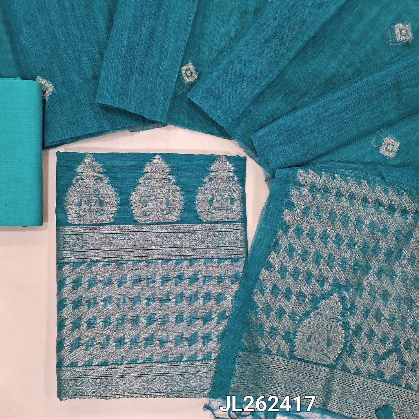 PREORDER SHIPPING AFTER 1 WEEEK Bright turquoise blue jamdani woven premium tussar unstitched salwar material,buttas on front, zari weaving daman, (textured, lining needed)silk cotton bottom, buttas on full length tussar dupatta with rich pallu. JL262417
