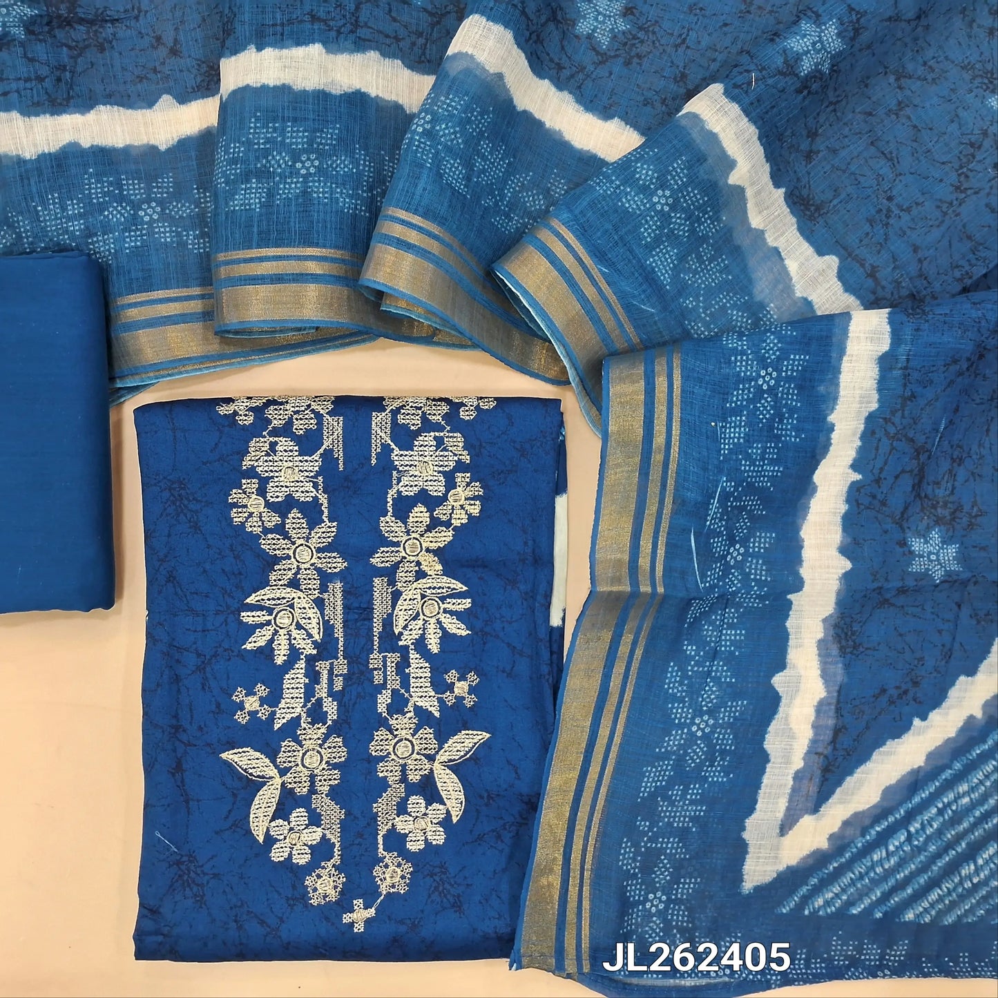 Ink blue satin cotton unstitched salwar material,thread and zari work on yoke,shibori print on daman,(lining optional)coton bottom, shibori design on semi linen dupatta with tissue borders. JL262405
