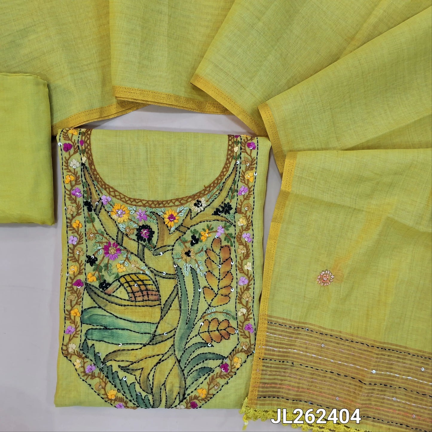Greenish yellow premium muga silk cotton unstitched salwar material, digital printed with rich hand embroidery work on yoke,embroidery on front,(lining needed)santoon bottom, hand embroidery work on muga silk cotton dupatta with tissue borders. JL262404