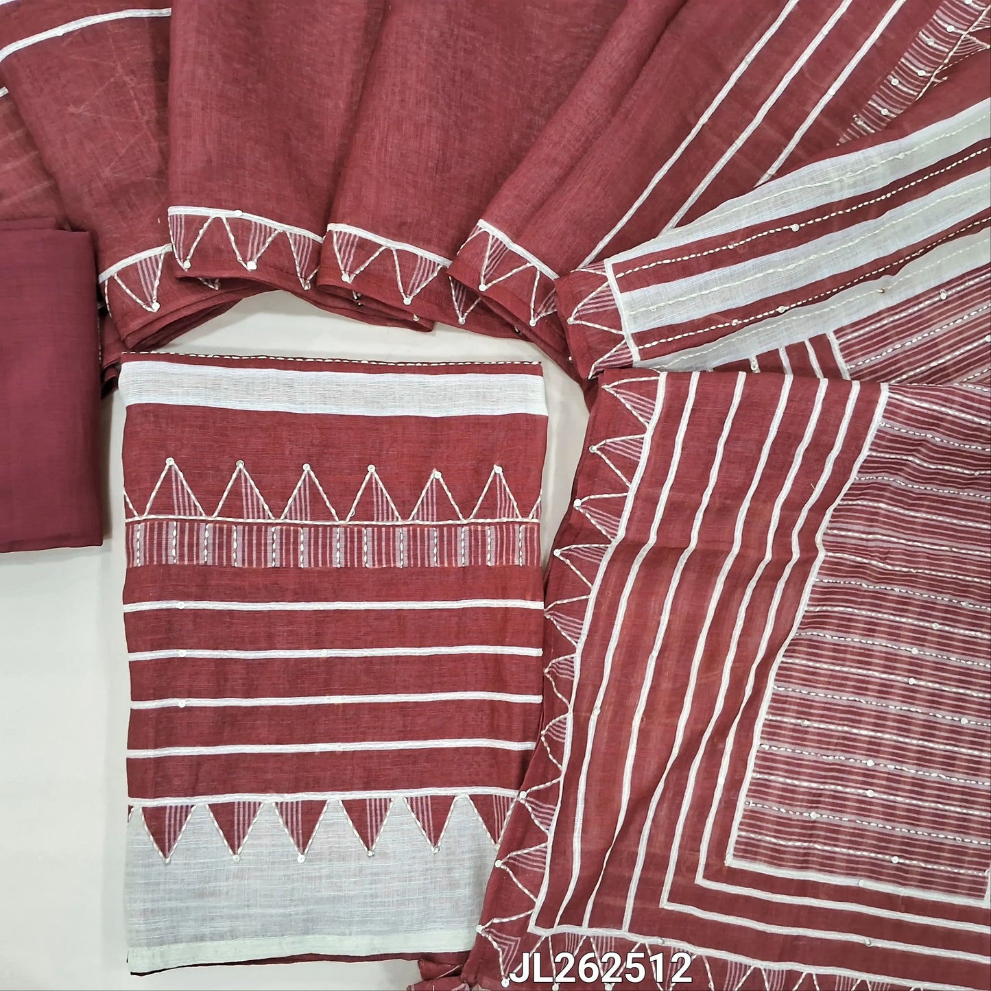 Dark maroon abstract printed premium linen salwar material, hand embroidery work on front,(textured, lining needed)santoon bottom, abstract printed, kantha stitch and sequins work on linen dupatta. JL262512
