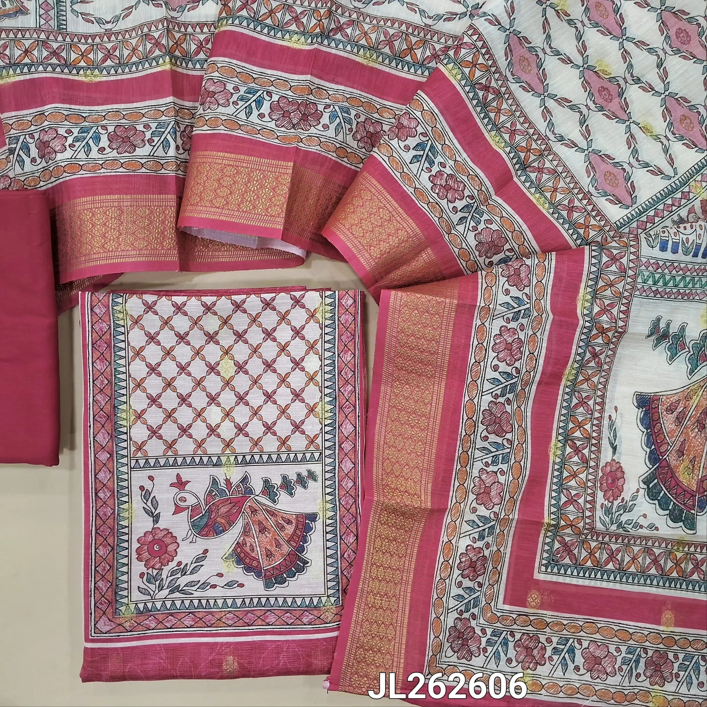 Pink silk cotton unstitched salwar material,digital printed yoke,zari buttas all over,(lining needed)spun cotton bottom, digital printed silk cotton dupatta with madhubani pallu and zari woven borders. JL262606