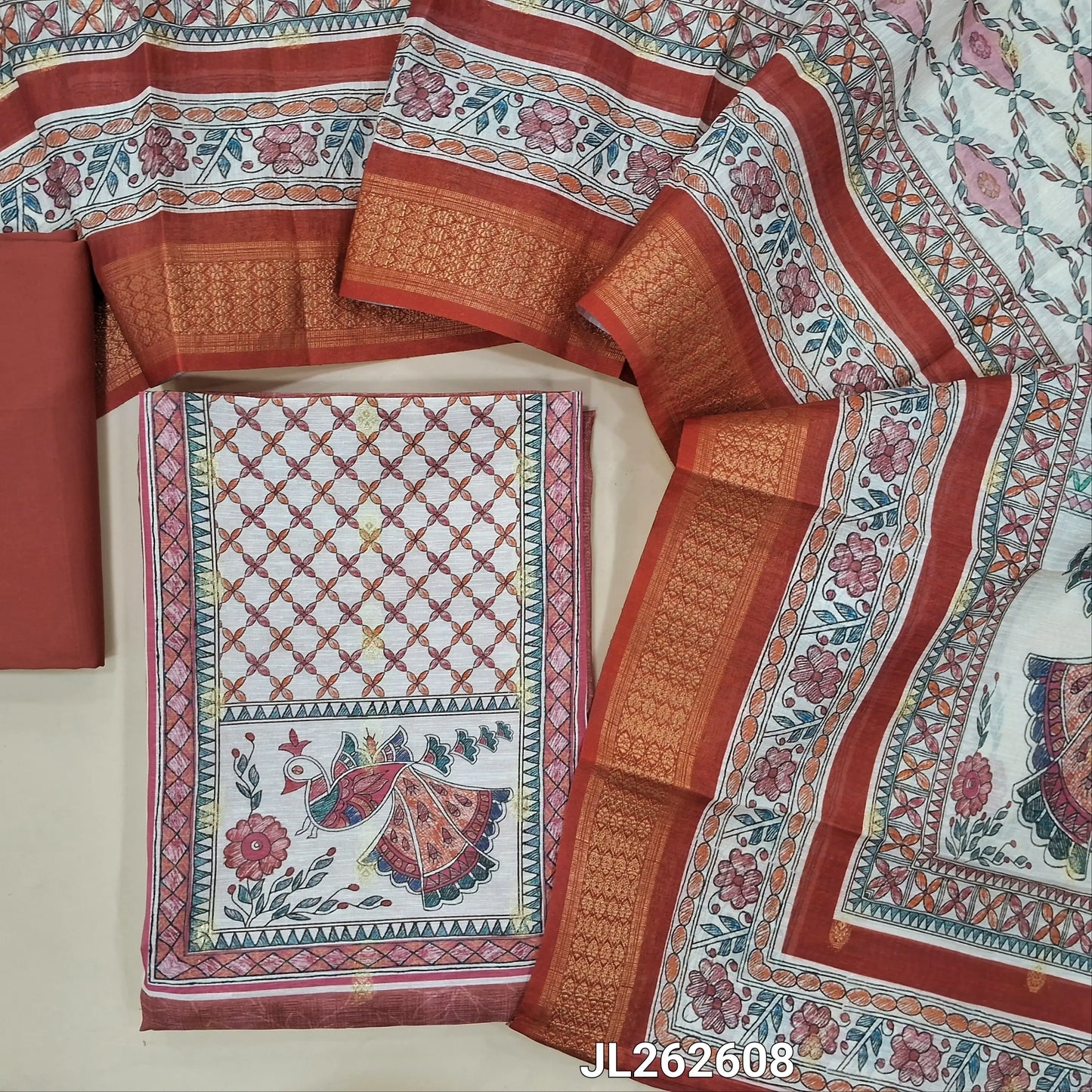 Dark onion pink silk cotton unstitched salwar material,digital printed yoke,zari buttas all over,(lining needed)spun cotton bottom, digital printed silk cotton dupatta with madhubani pallu and zari woven borders. JL262608