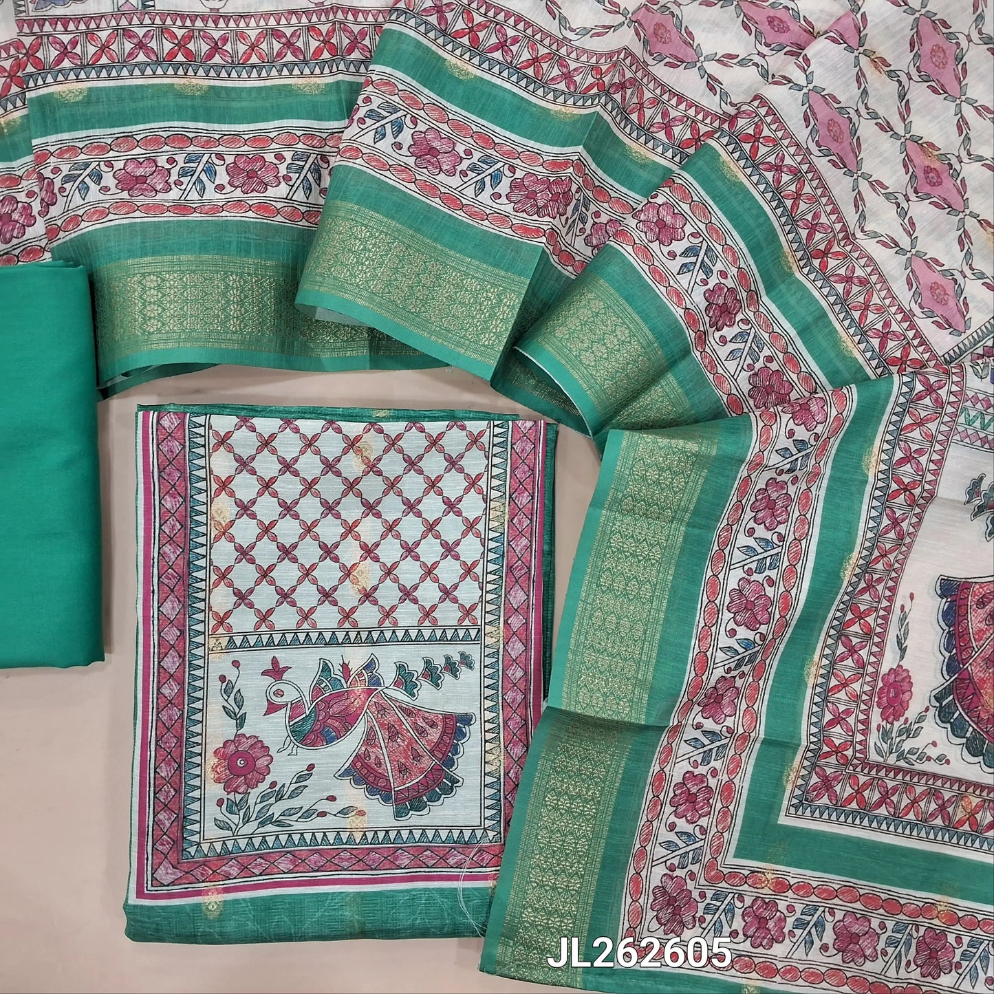 Turquoise green silk cotton unstitched salwar material,digital printed yoke,zari buttas all over,(lining needed)spun cotton bottom, digital printed silk cotton dupatta with madhubani pallu and zari woven borders. JL262605