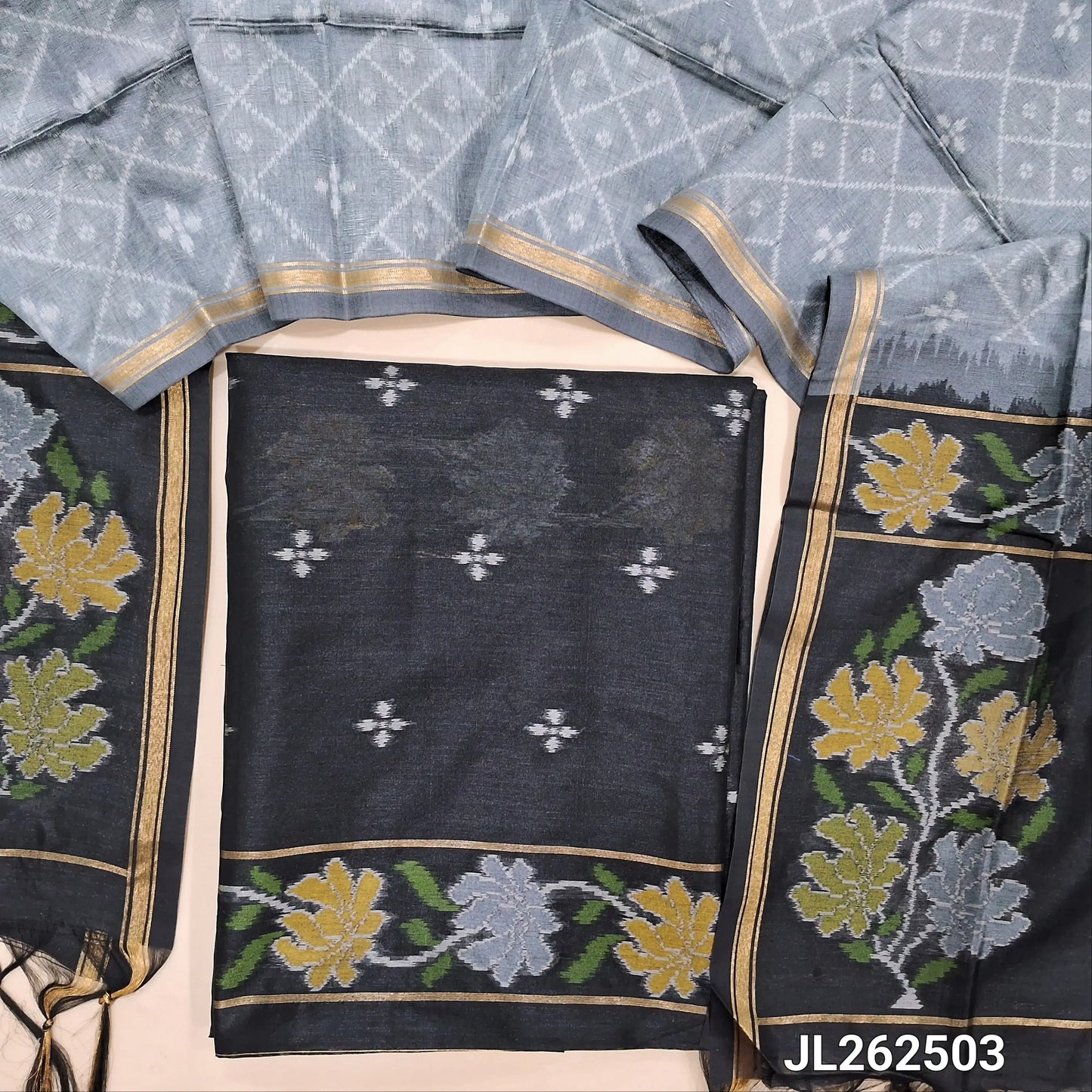 Black premium silk unstitched salwar material, thread weaving all over and daman,(light weight,lining needed)NO BOTTOM,rich weaving on premium silk dupatta with pallu and tissue borders. JL262503