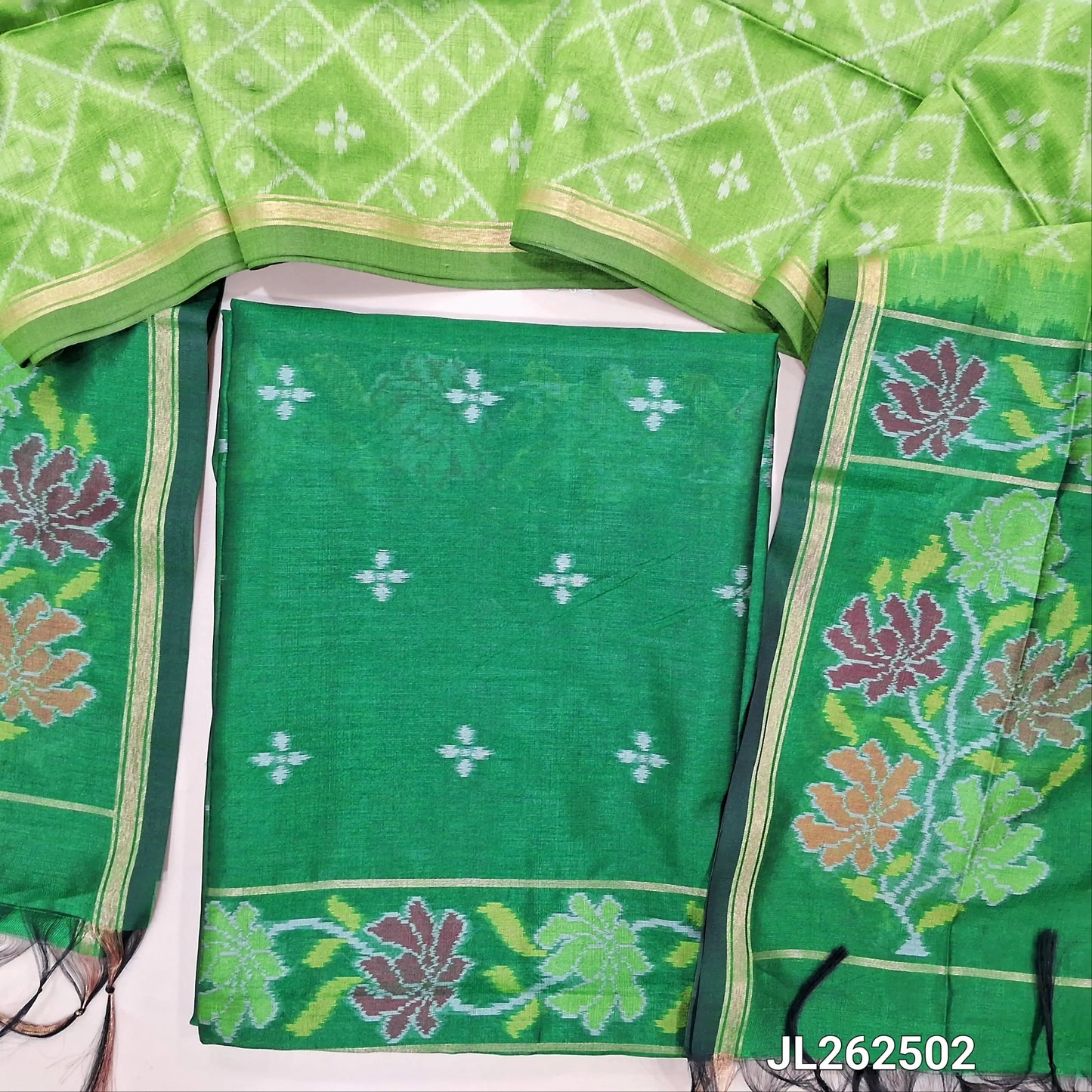 Emerald green premium silk unstitched salwar material, thread weaving all over and daman,(light weight,lining needed)NO BOTTOM,rich weaving on premium silk dupatta with pallu and tissue borders. JL262502