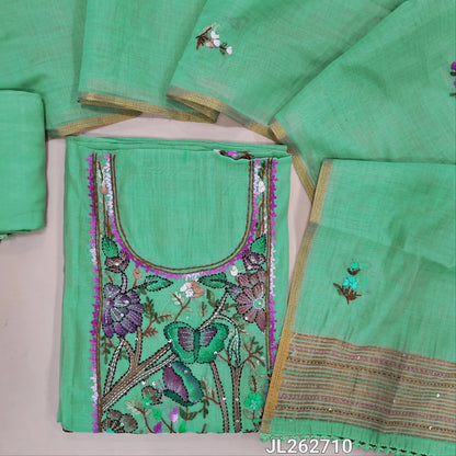 Sea green premium muga silk cotton unstitched salwar material, brush paint with rich hand embroidery work on yoke,embroidery on front,(lining needed)santoon bottom, hand embroidery work on muga silk cotton dupatta with tissue borders. JL262710