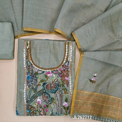Grey premium muga silk cotton unstitched salwar material, brush paint with rich hand embroidery work on yoke,embroidery on front,(lining needed)santoon bottom, hand embroidery work on muga silk cotton dupatta with tissue borders. JL262712