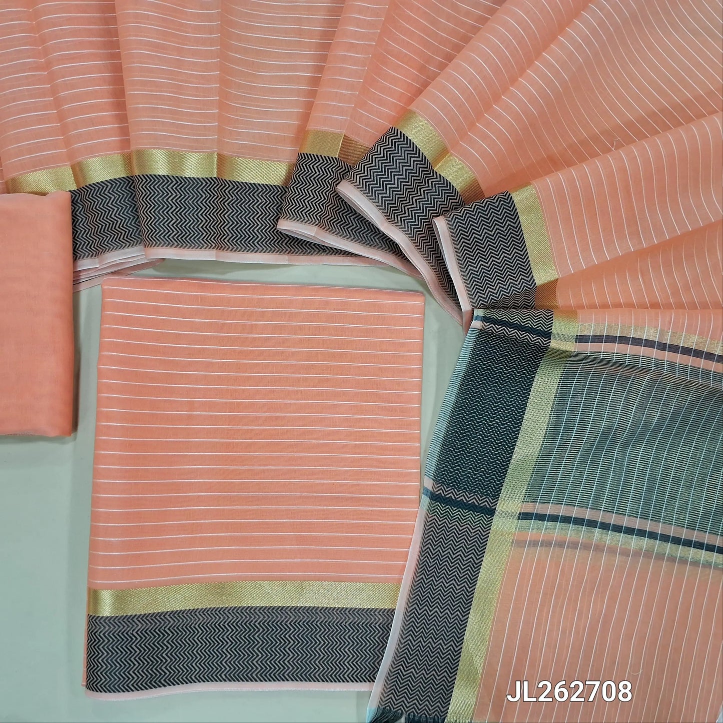 Pastel peach silk cotton unstitched salwar material,thread woven lines all over, thread woven daman ,(lining needed)thin silk cotton fabric provided for lining, NO BOTTOM, silk cotton dupatta with gold tissue pallu and thread woven borders. JL262708