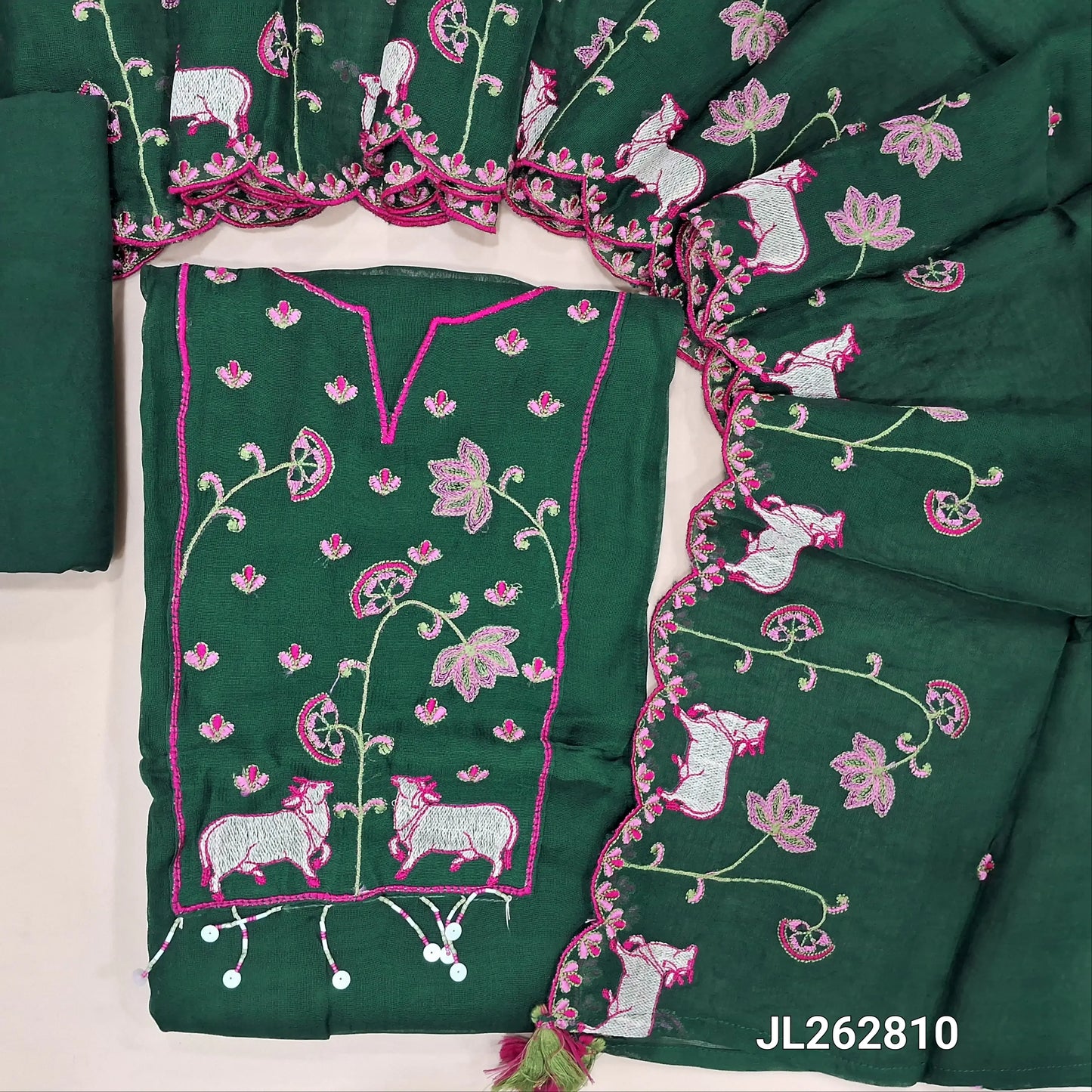 Bottle green premium viscous organza unstitched salwar material,round notch neck with thread embroidery work and daman,(thin, lining needed)santoon bottom, viscous organza dupatta with embroidery work and scallop borders. JL262810