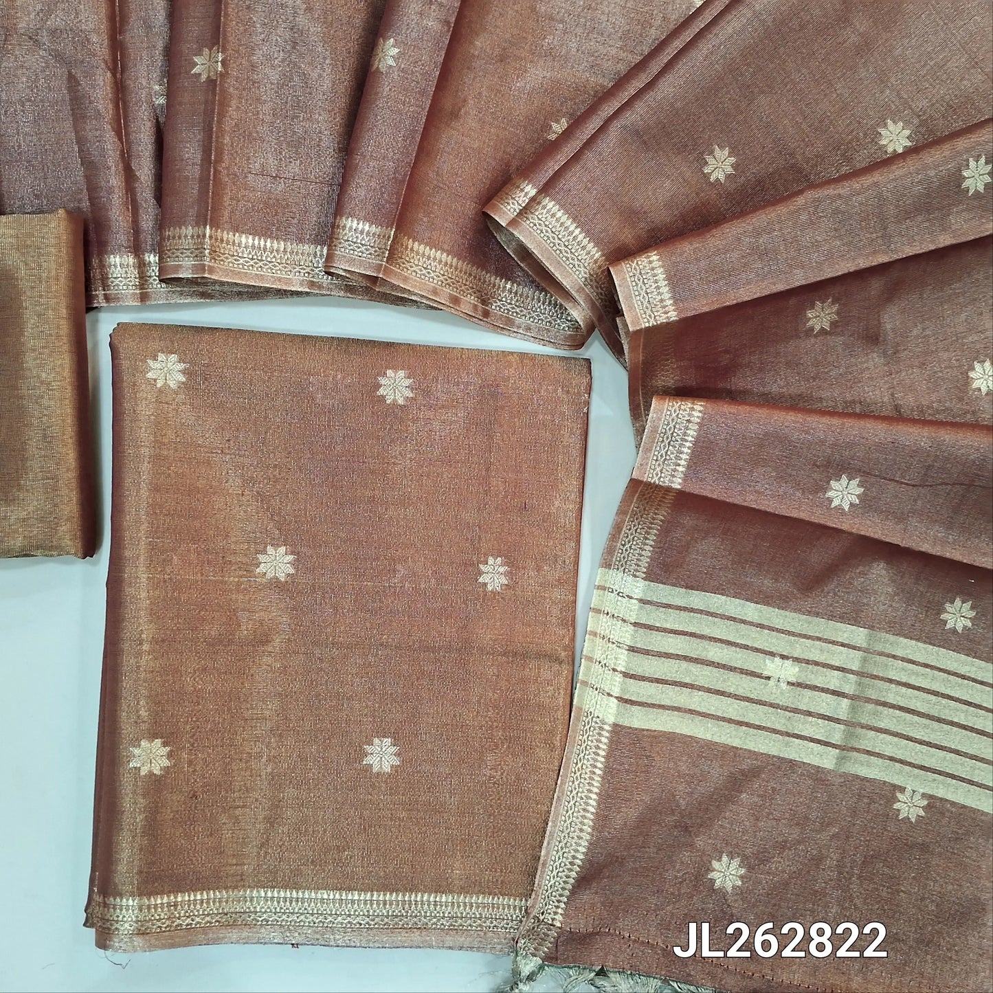 Maroon with golden tint tissue silk cotton unstitched salwar material, zari buttas all over, zari daman borders, (silky, lining needed)tissue silk cotton bottom, zari buttas on tissue silk cotton dupatta with zari borders. JL262822