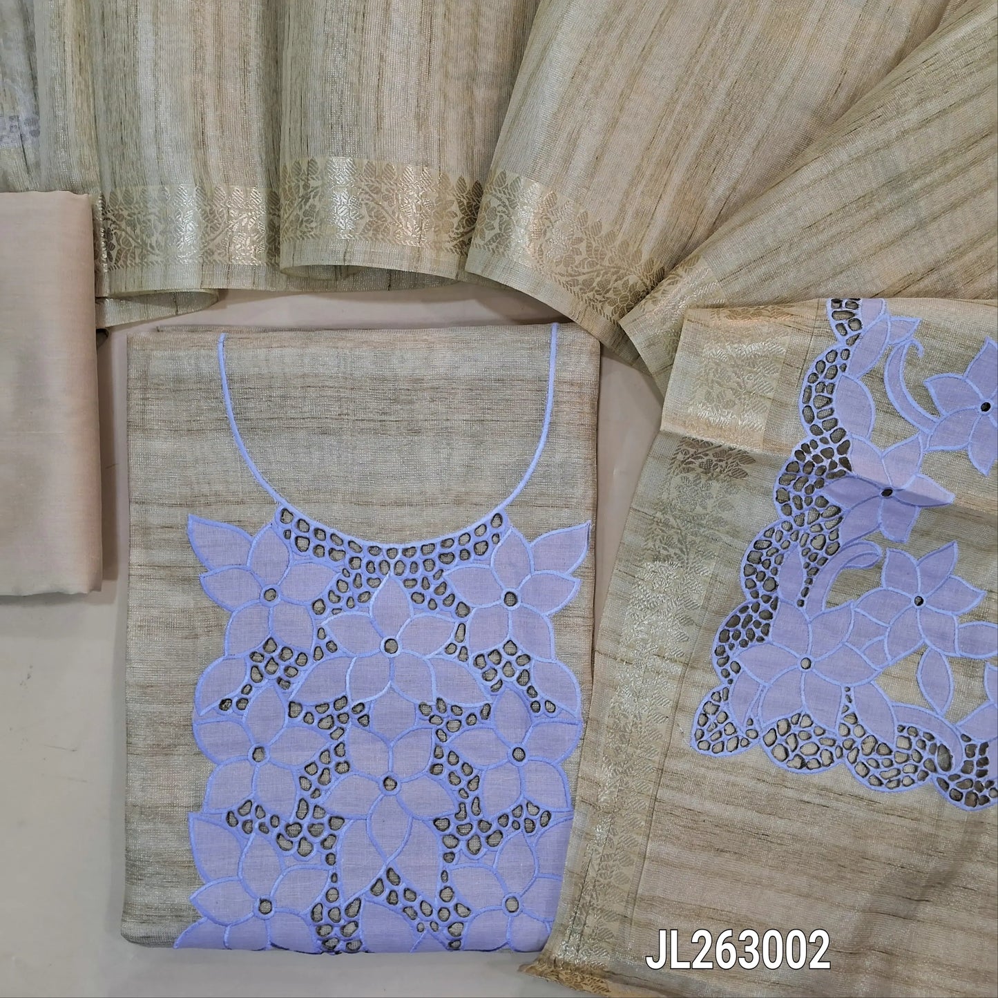 Rich beige with golden tint tissue silk cotton unstitched salwar material, (PASTEL BLUE)applique and cutwork on yoke,(lining needed)silk cotton bottom, tissue silk cotton dupatta with applique and cutwork pallu and zari borders. JL263002