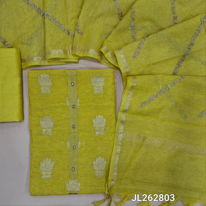 Yellow slub silk unstitched salwar material,benarasi zari woven all over, simple yoke, (lining needed)silky bottom, zari embroidery onslub silk dupatta with tissue borders. JL262803