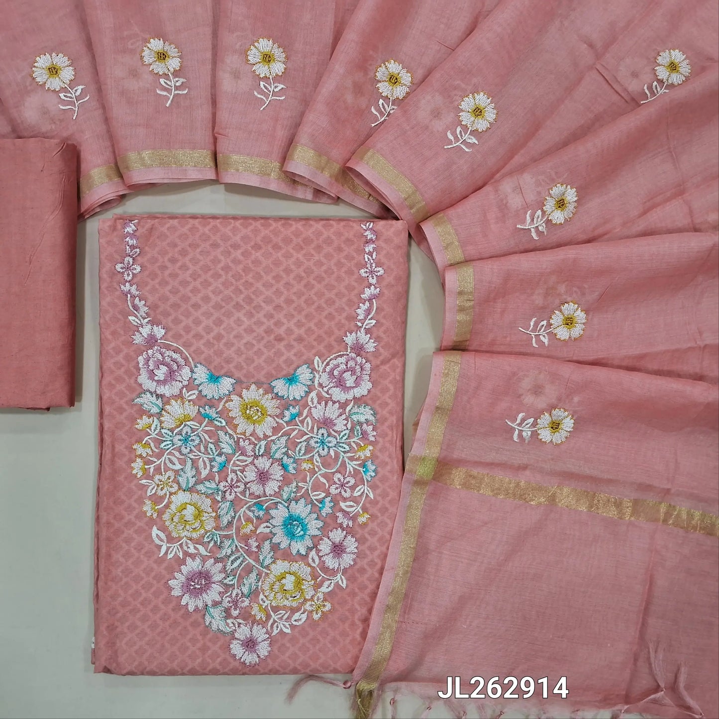 Peachish pink jakard cotton unstitched salwar material,thread embroidery on yoke,self woven design all over, (lining needed) silky bottom, embroidery on mul chanderi dupatta with tissue borders(TAPPING NEEDED). JL262914