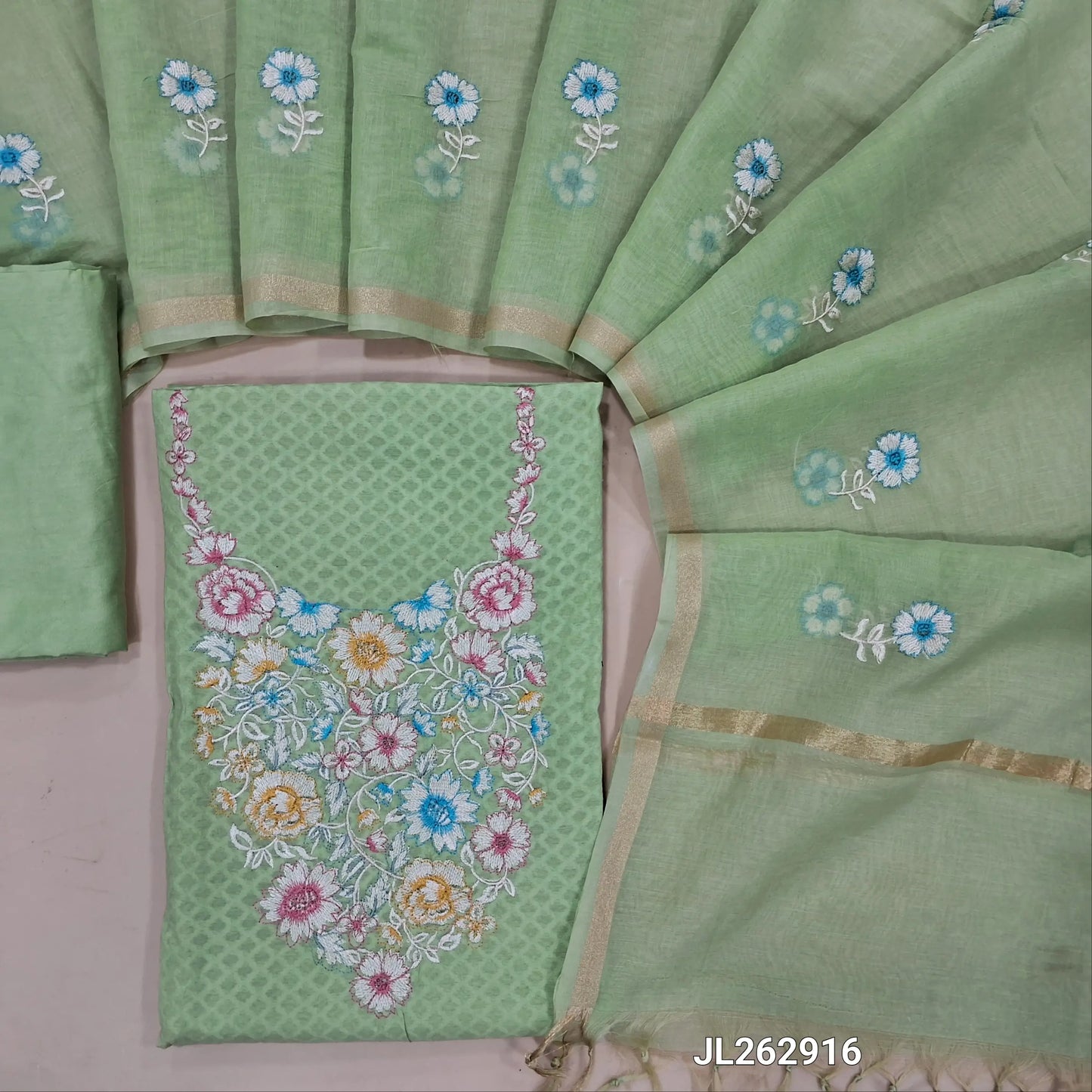 Pastel green jakard cotton unstitched salwar material,thread embroidery on yoke,self woven design all over, (lining needed) silky bottom, embroidery on mul chanderi dupatta with tissue borders(TAPPING NEEDED). JL262916