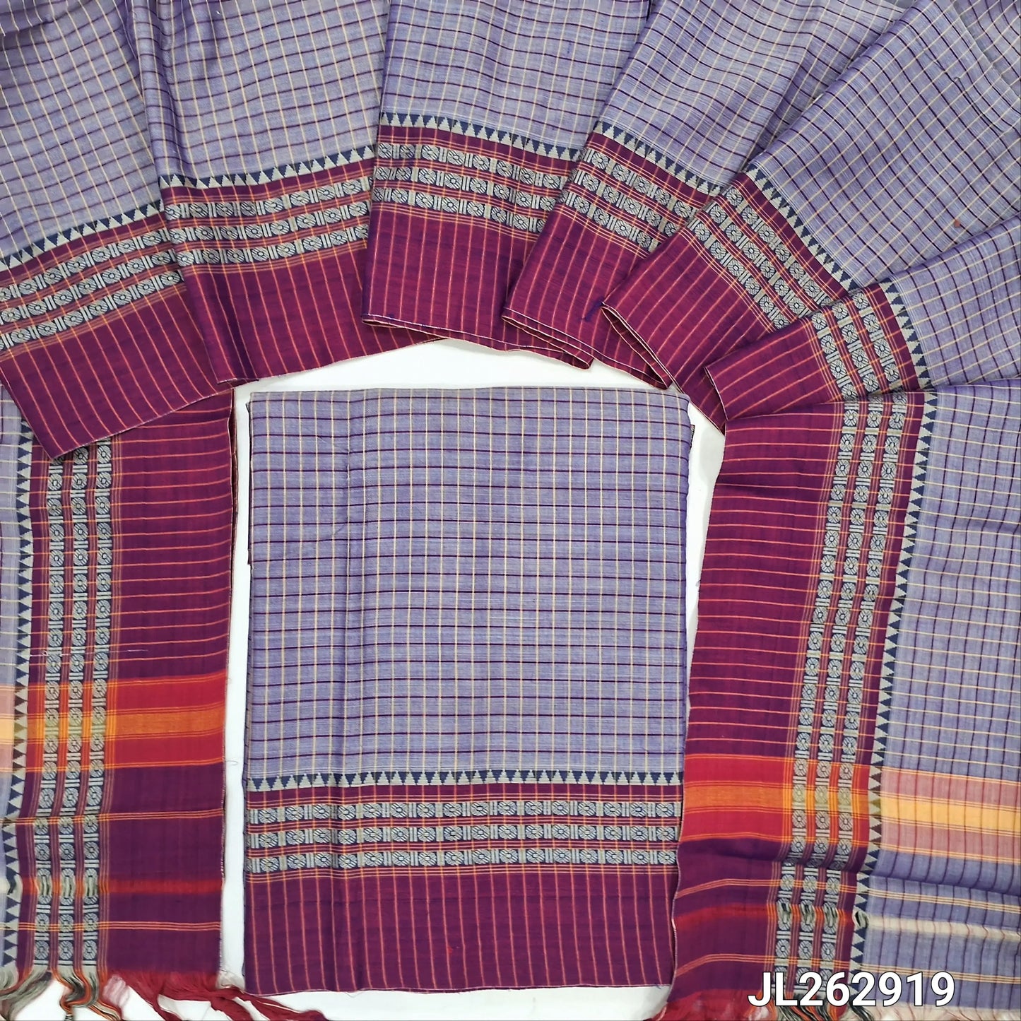 Light purplish pink south mercerized handloom cotton unstitched salwar material(thin, lining needed) checked all over with contrast thread woven border, bottom included with top, checked mercerized handloom cotton dupatta with tassels. JL262919