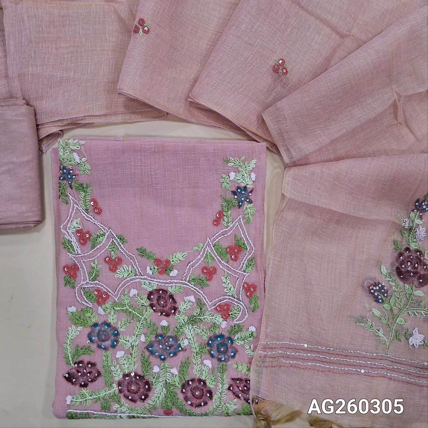 Pastel pink premium muga silk cotton unstitched salwar material,  rich hand embroidery work on yoke,embroidery on front,(lining needed)santoon bottom, hand embroidery work on muga silk cotton dupatta. AG260305