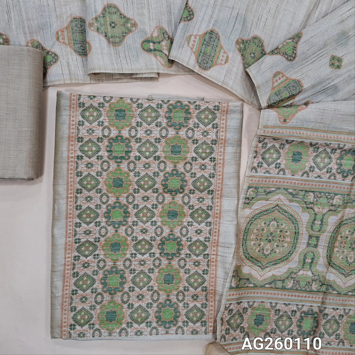Rich beige jamdani woven premium tussar unstitched salwar material,thread woven buttas all over,GREEN,(lining needed)silk cotton bottom, jamdani woven full length tussar dupatta wIth hand made tassles and borders. AG260110
