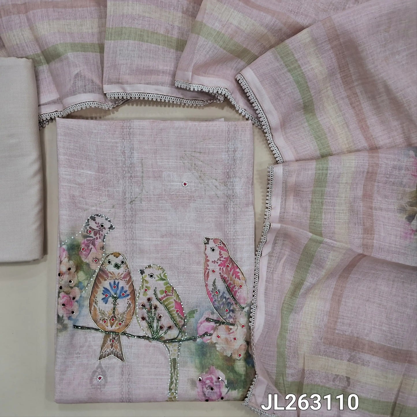 Light peachish pink semi linen unstitched salwar material, bird printed with sugar bead and cut bead work on yoke, floral and bead work on daman,(lining needed)spun cotton bottom, digital printed semi linen dupatta with lace tapping. JL263110