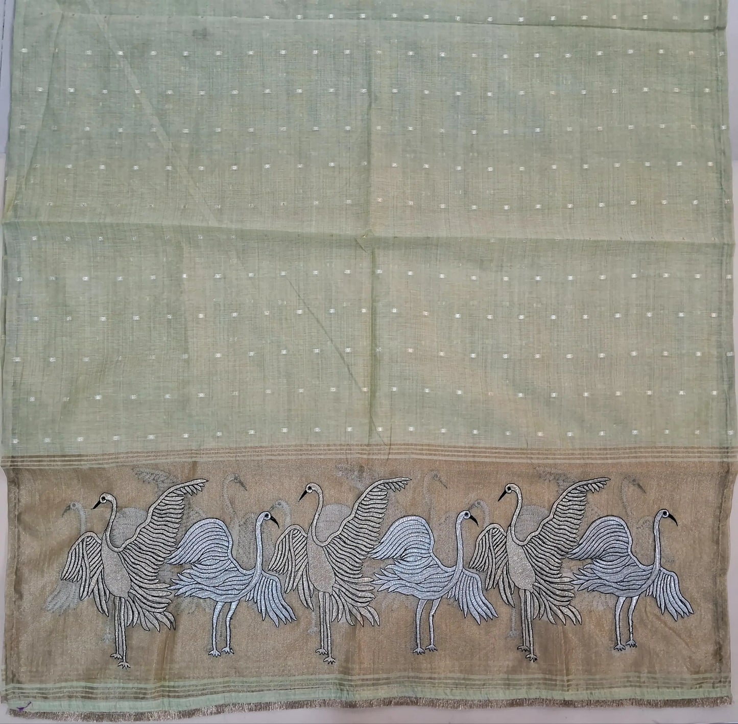 Light greyish beige premium silk cotton unstitched salwar material,buttas all over,silver& anti gold zari embroidery,tissue daman(lining needed)matching santoon bottom, soft silk cotton dupatta with silver gold tissue with zari work pallu. AG260202