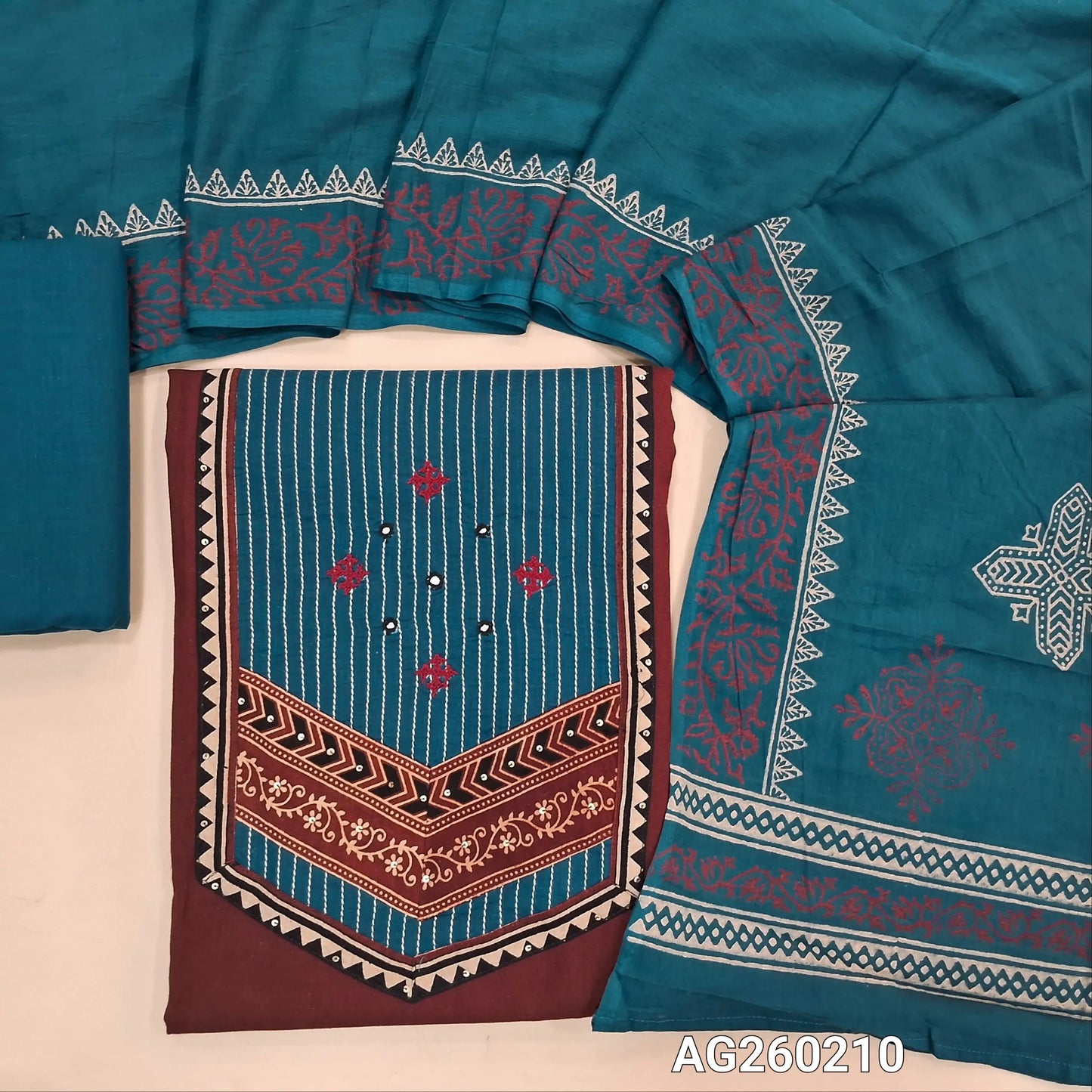 Dark maroon premium dabu cotton unstitched salwar material,contrast ajrak yoke patch with hand embroidery and kantha stitch(soft,lining optional)teal blue cotton bottom, block printed mul cotton dupatta. AG260210