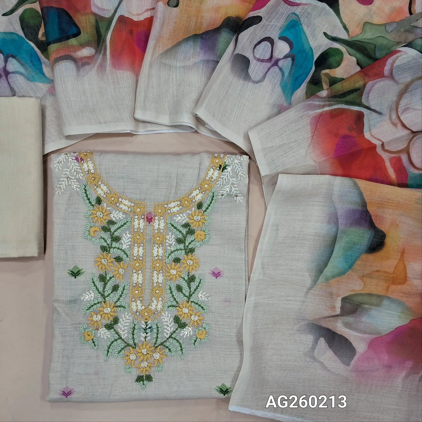 Light beige designer premium silk cotton unstitched salwar material, yellow floral embroidered on yoke(thin fabric, lining needed)matching drum dyed lining provided, NO BOTTOM, abstract printed semi linen dupatta. AG260213