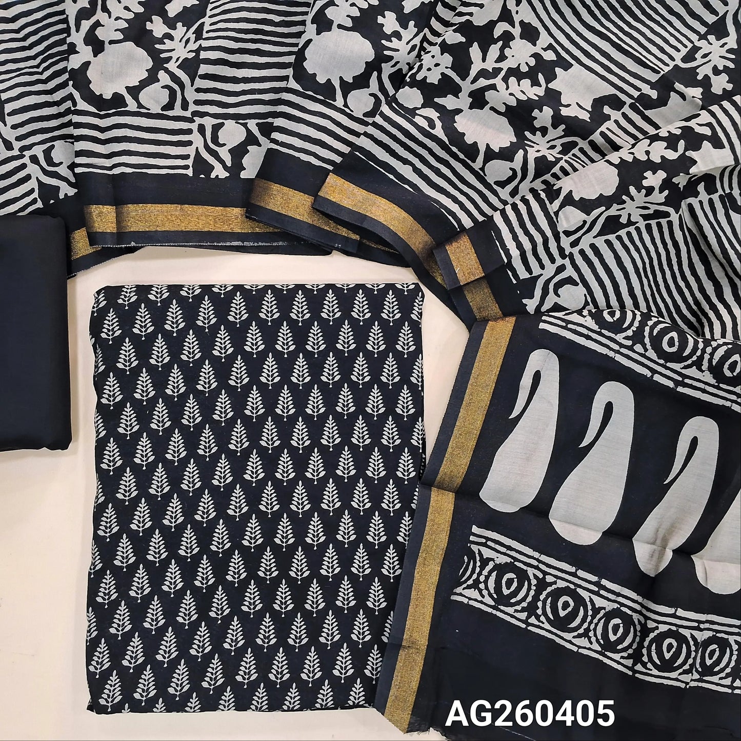 Black silk cotton unstitched salwar material,digital printed all over,(lining needed)cotton bottom,printed full length soft silk cotton dupatta with tissue borders(TAPPING NEEDED). AG260405
