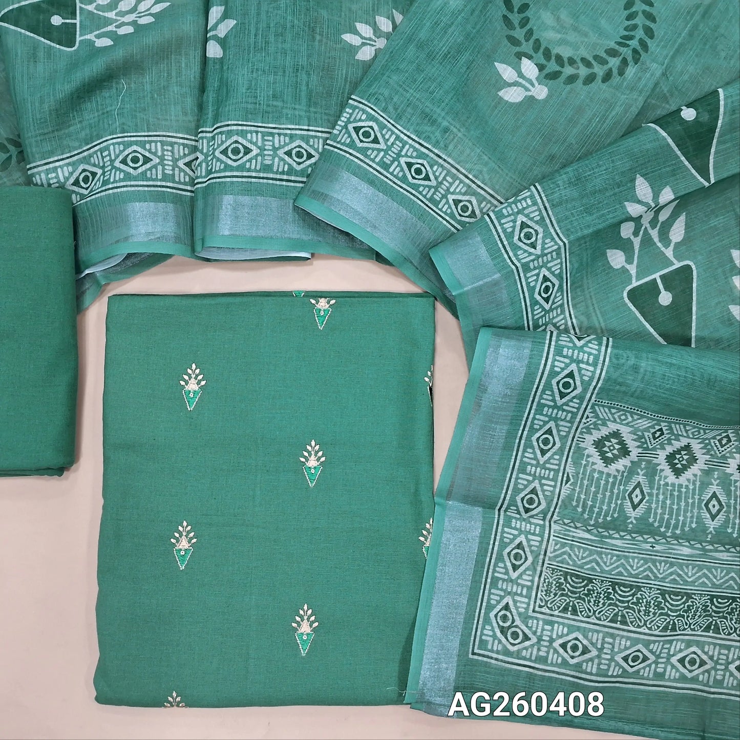 Sage green pure cotton unstitched salwar material,embroidery on front,(lining optional) cotton bottom, printed on semi linen dupatta with silver tissue borders. AG260408