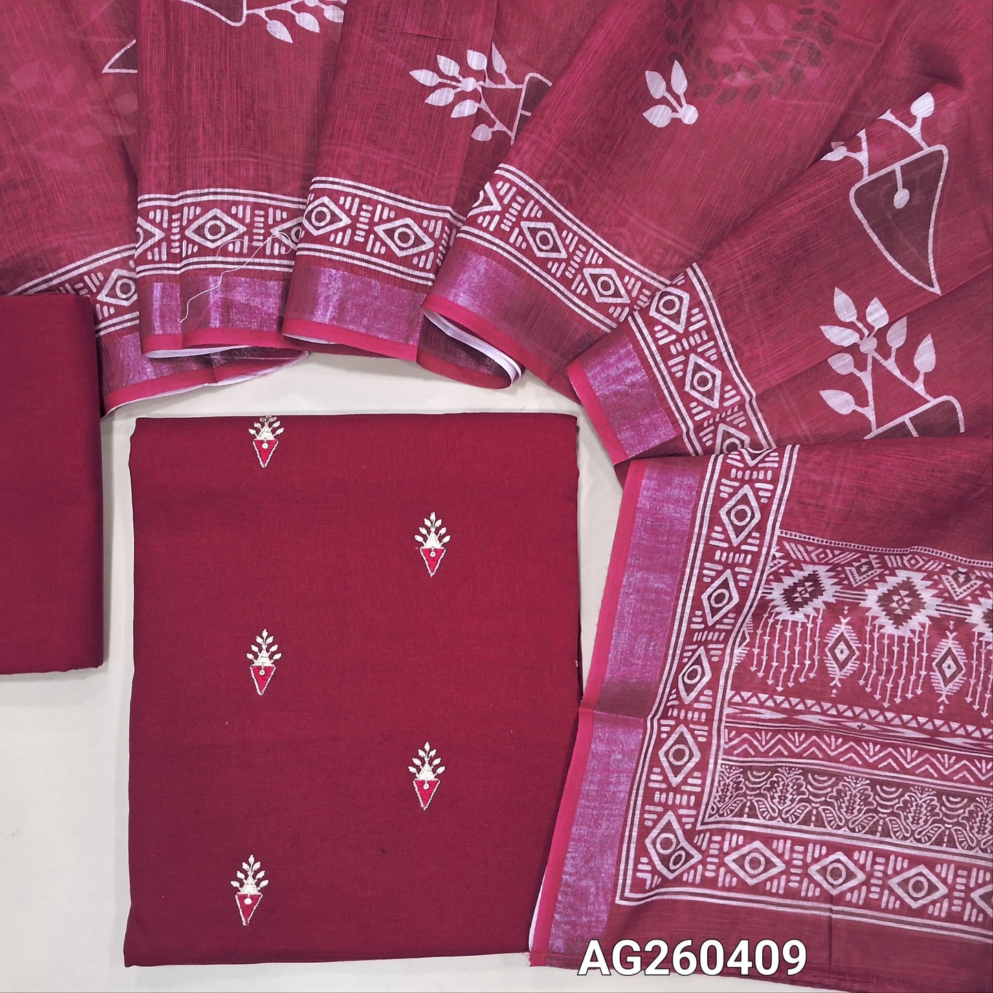 Dark pink pure cotton unstitched salwar material,embroidery on front,(lining optional) cotton bottom, printed on semi linen dupatta with silver tissue borders. AG260409