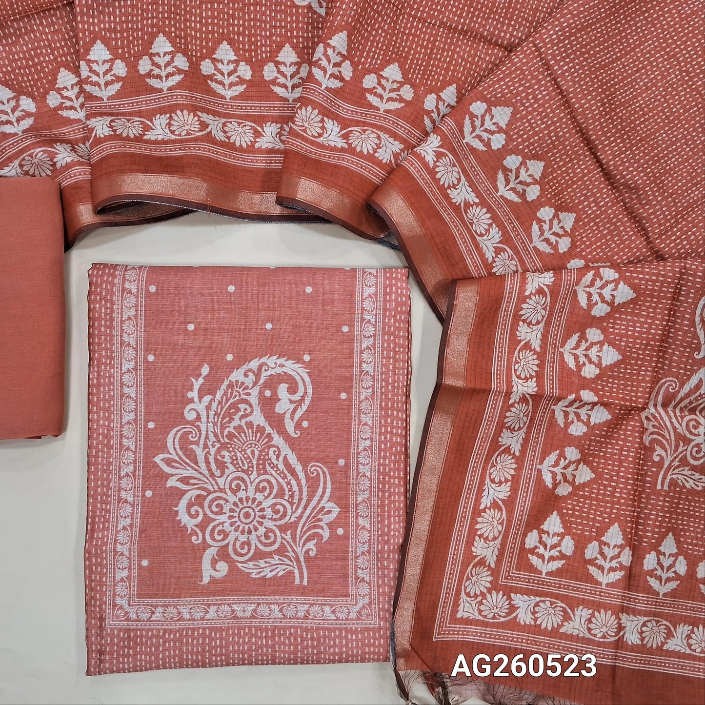 Peachish pink printed soft silk cotton unstitched salwar material, printed yoke,(lining needed)spun cotton bottom,digital printed soft silk cotton dupatta with tissue borders. AG260523