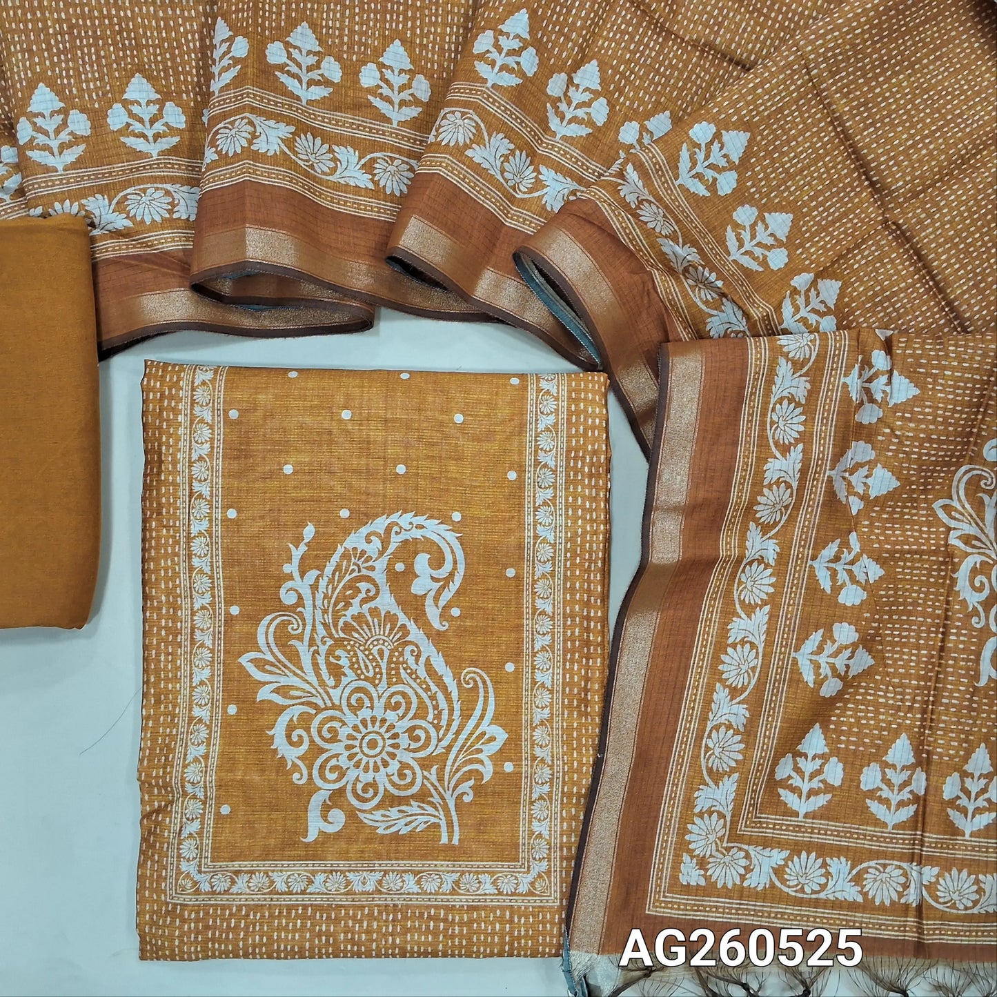 Rust orange printed soft silk cotton unstitched salwar material, printed yoke,(lining needed)spun cotton bottom,digital printed soft silk cotton dupatta with tissue borders. AG260525