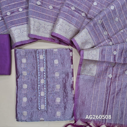Lavender with golden tint crinkled tissue silk cotton unstitched salwar material,mirror on yoke, buttas all over,(thin, lining needed)silky/silk cotton bottom, zari woven and vertical design on crinkled tissue silk cotton dupatta with borders. AG260508