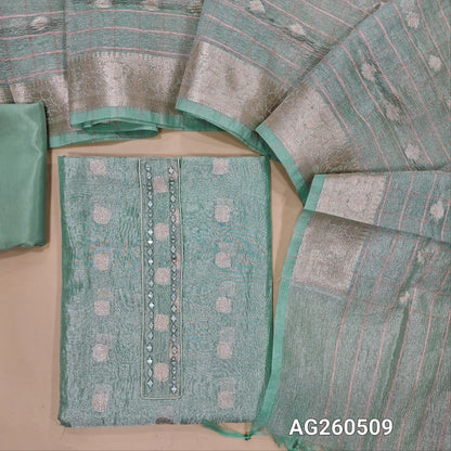 Pastel blue with golden tint crinkled tissue silk cotton unstitched salwar material,mirror on yoke, buttas all over,(thin, lining needed)silky/silk cotton bottom, zari woven and vertical design on crinkled tissue silk cotton dupatta with borders. AG260509