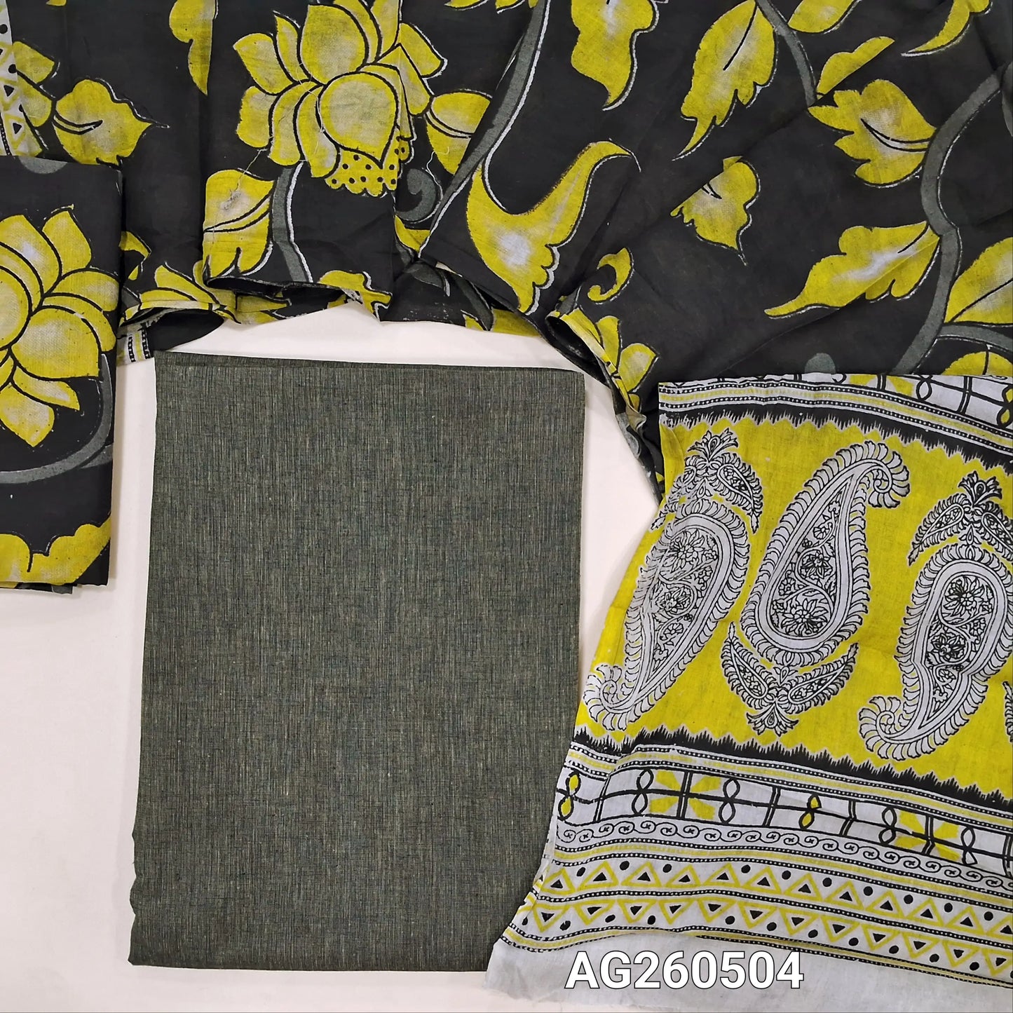 Dark grey handloom cotton unstitched salwar material,(lining optional)black kalamkari hand block printed cotton bottom,kalamkari hand block printed mul cotton dupatta with contrast pallu. AG260504