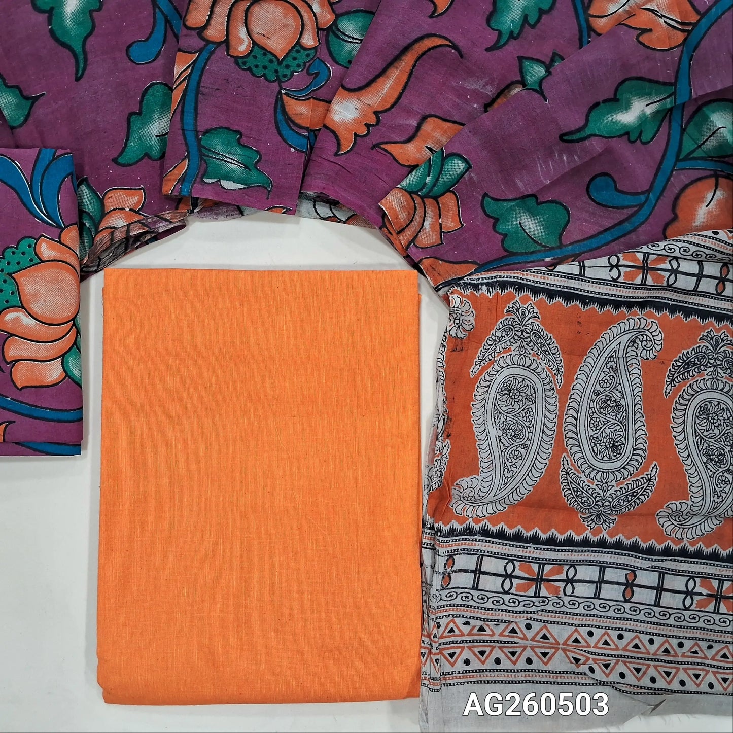 Orange handloom cotton unstitched salwar material,(lining optional)pink kalamkari hand block printed cotton bottom,kalamkari hand block printed mul cotton dupatta with contrast pallu. AG260503