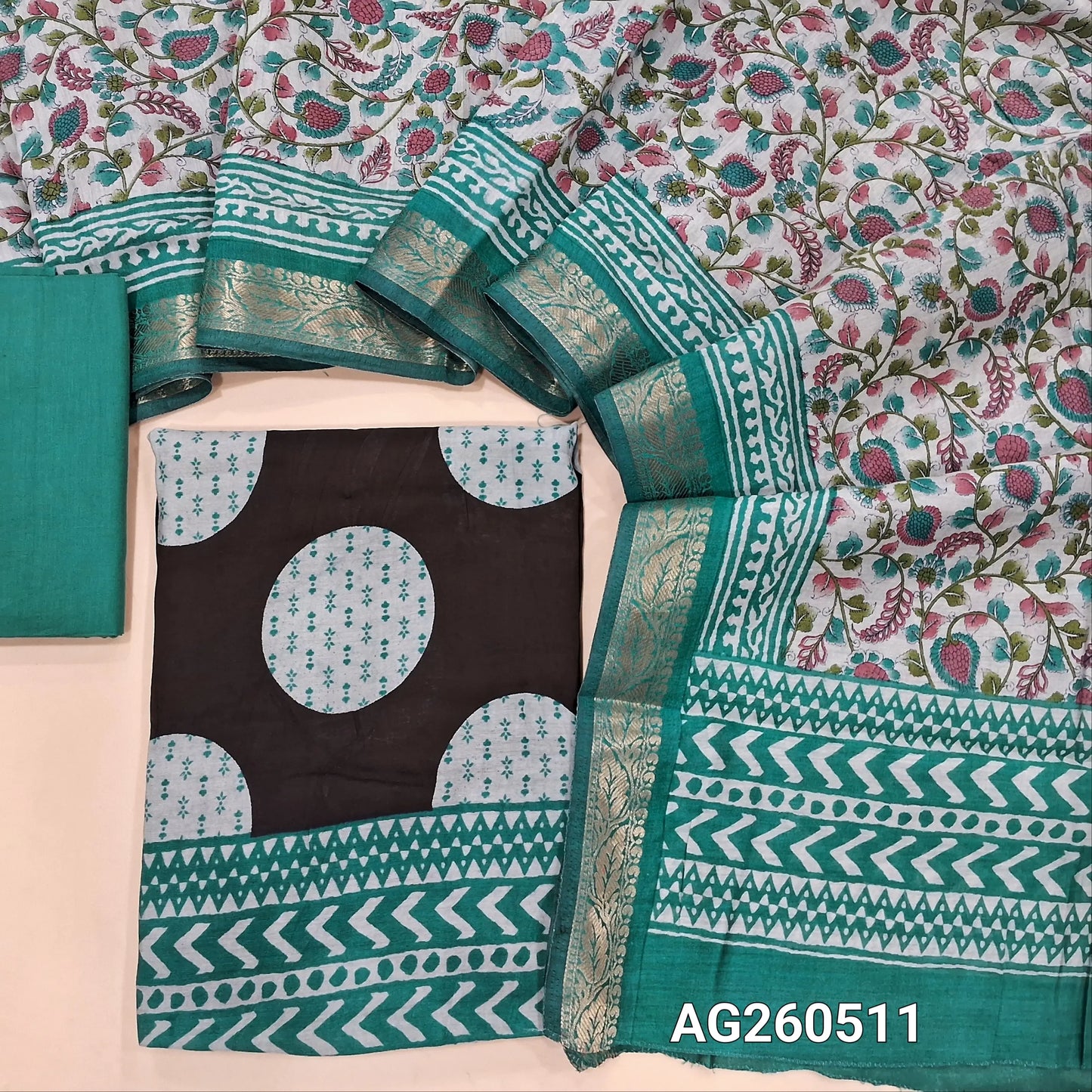 Black base soft silk cotton unstitched salwar material,polka design, printed all over,(lining needed)blue cotton bottom,floral printed silk cotton dupatta with borders and pallu. AG260511